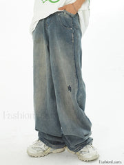 Men’s Faded Patchwork Distressed Loose Jeans Blue / M loose jeans