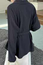 Waist Defining Plunge Neck Blouse
