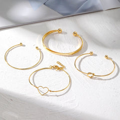 4-Piece Creative Heart Crossed Alloy Bangle Bracelet Set