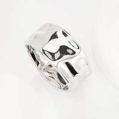 Sleek Textured Metal Spring Open Cuff Bracelet