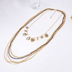 Layered Bead Chain Geometric Charm Statement Necklace