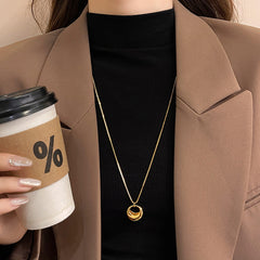 Long Gold Circle And Teardrop Pendant Necklace