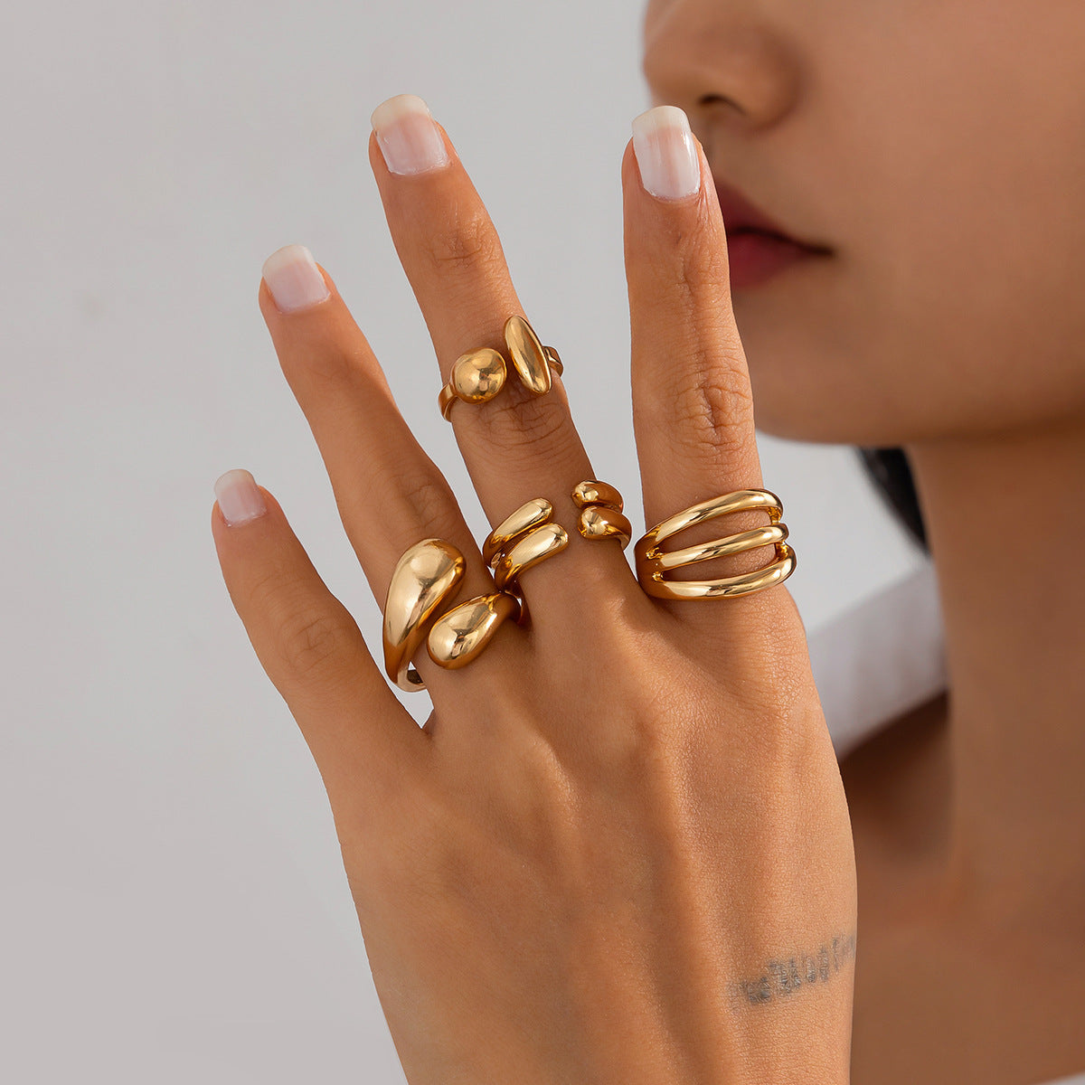 4-Piece Polished Liquid Metal Textured Ring Set Main image
