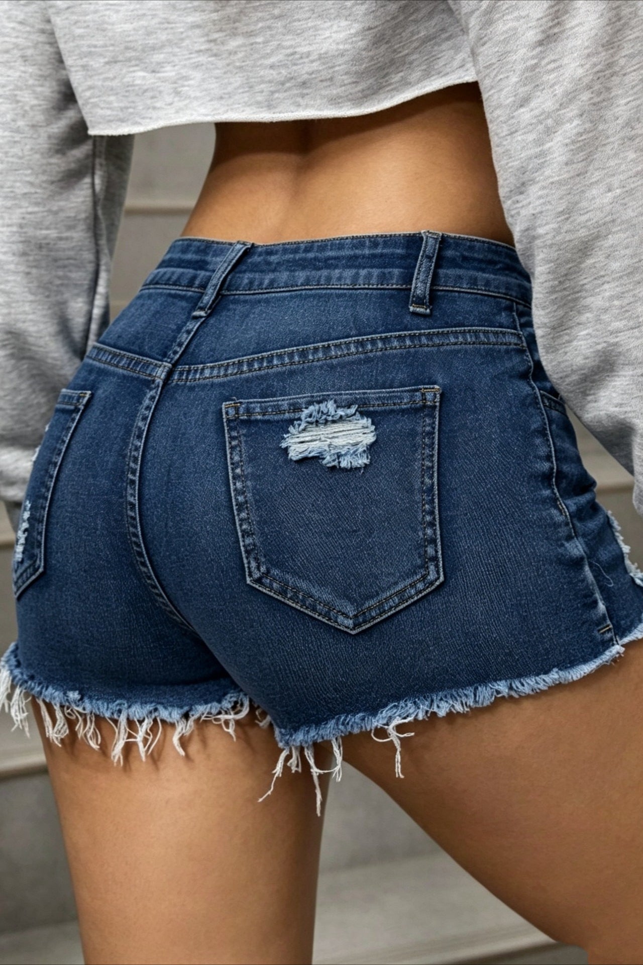 Distressed Low Rise Frayed Hem Denim Shorts