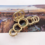 Gold Tone Round Openwork Hair Claw