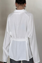 Waist Defining Plunge Neck Blouse